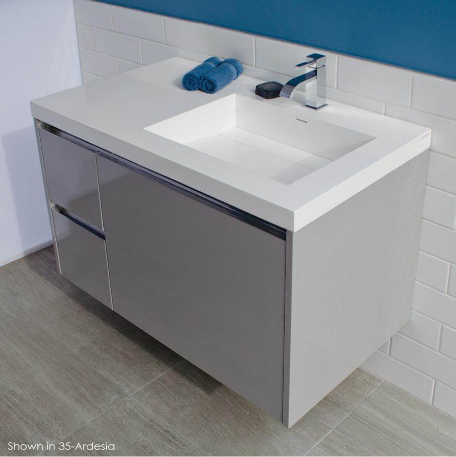 Lacava Wall-mount under counter vanity with three drawers, Bathroom Sink  is on the right.